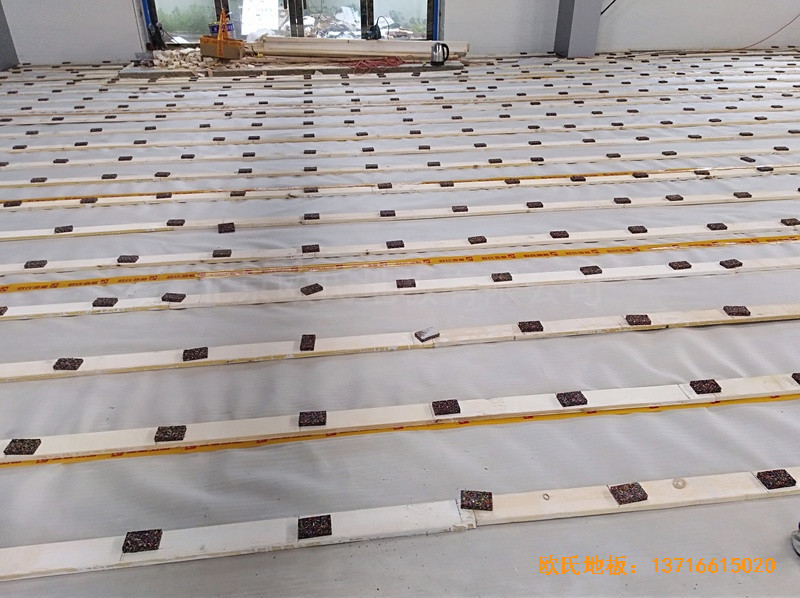 安徽懷寧縣新明源電力公司羽毛球館體育地板鋪裝案例3