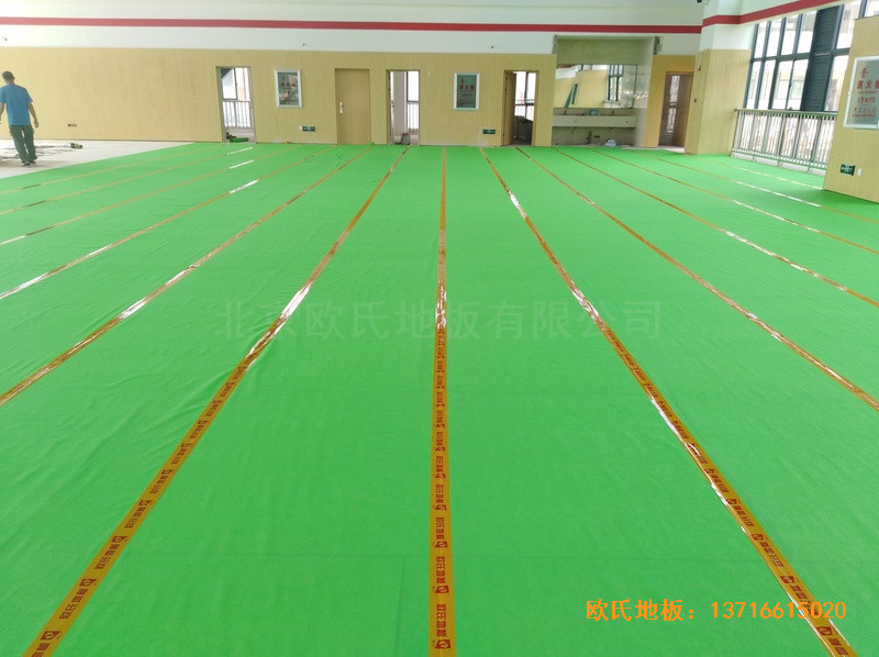 云南倪家營第三小學(xué)籃球館運動木地板安裝案例2